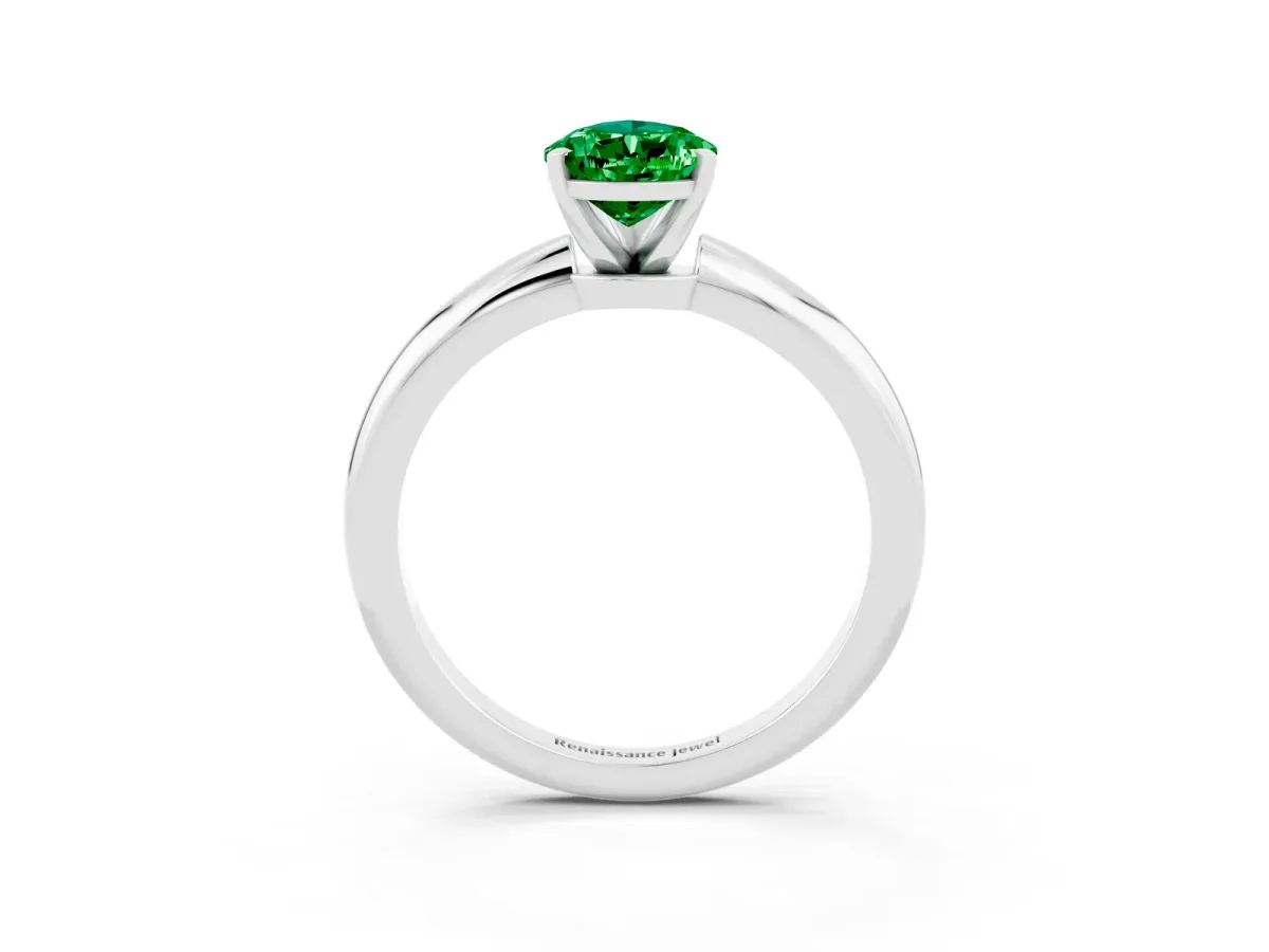 Pear Cut Emerald Solitaire Ring with Six-Prong Setting and Classic Band Silver