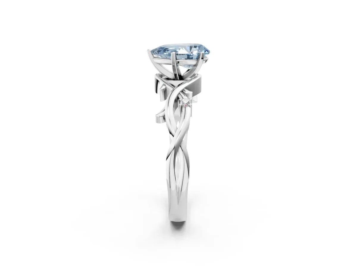 Fancy Blue Pear Cut Diamond Solitaire Ring with Twisted Band and Prong Setting White gold