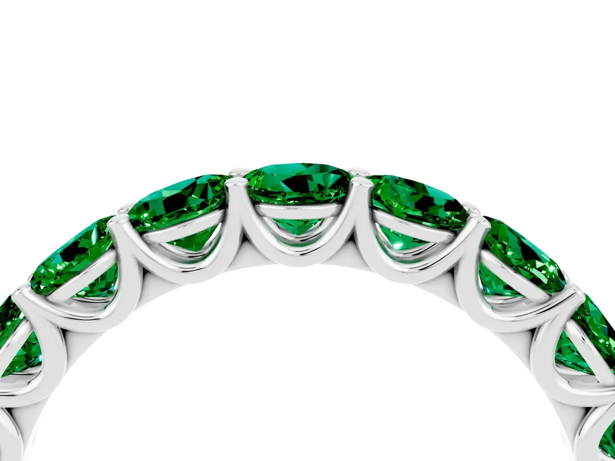 Round Emerald Shared Prong Eternity Band White gold