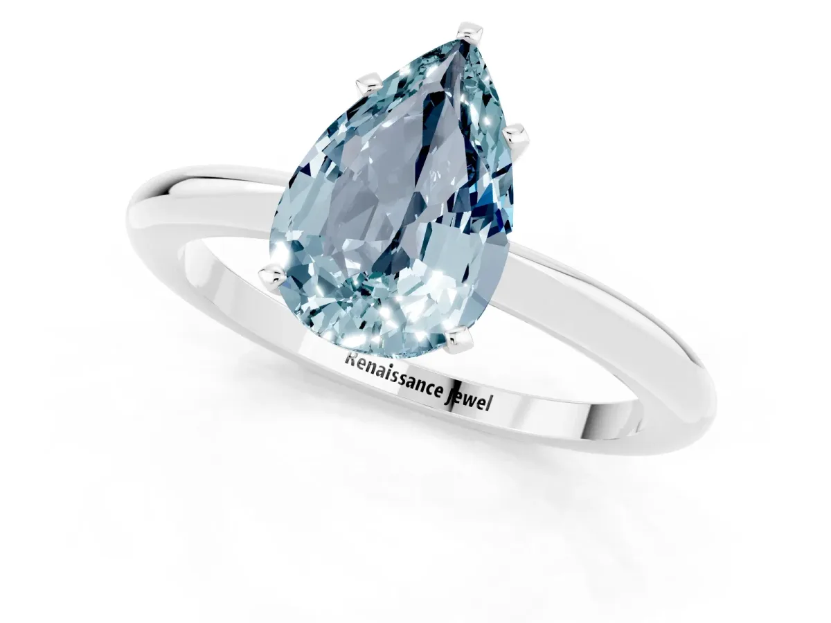 Pear Cut Aquamarine Solitaire Ring with Six-Prong Setting and Classic Band Silver