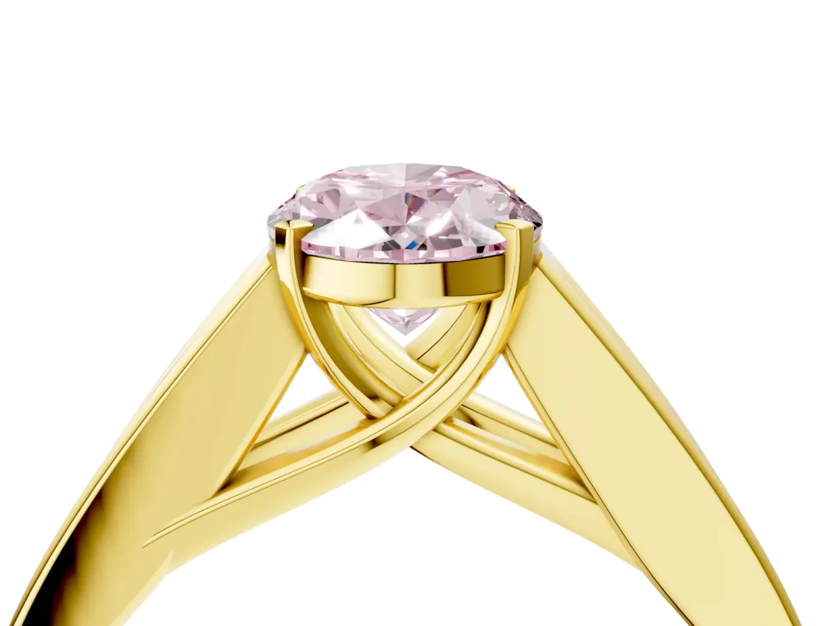 Fancy Pink Oval Cut Cut Channel Set Solitaire Ring with Four-Prong Setting Yellow gold