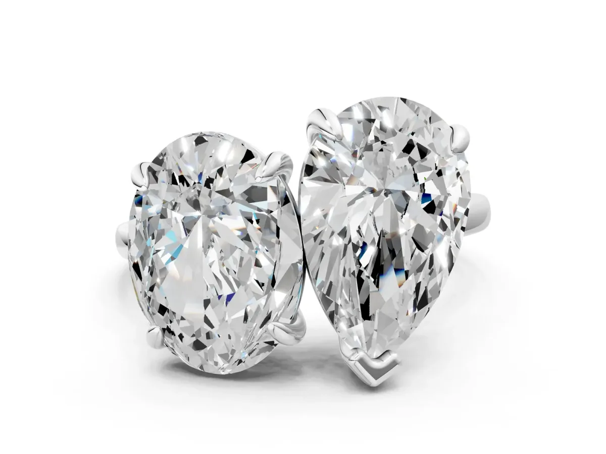 Oval and Pear Toi Moi Ring with Prong Setting and Plain Band Silver