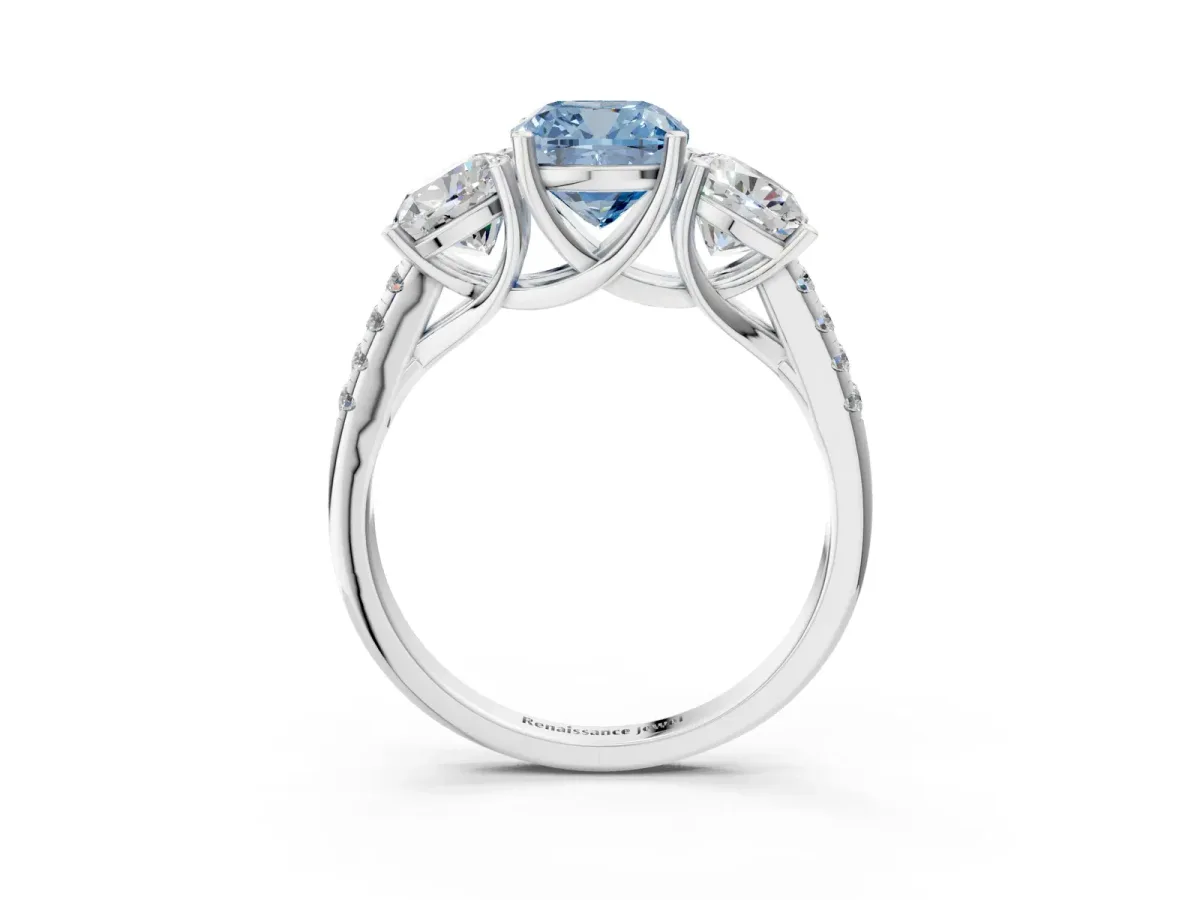 Fancy Blue Three-Stone Cushion Cut Diamond Ring with Round Pavé Band and Prong Setting Silver