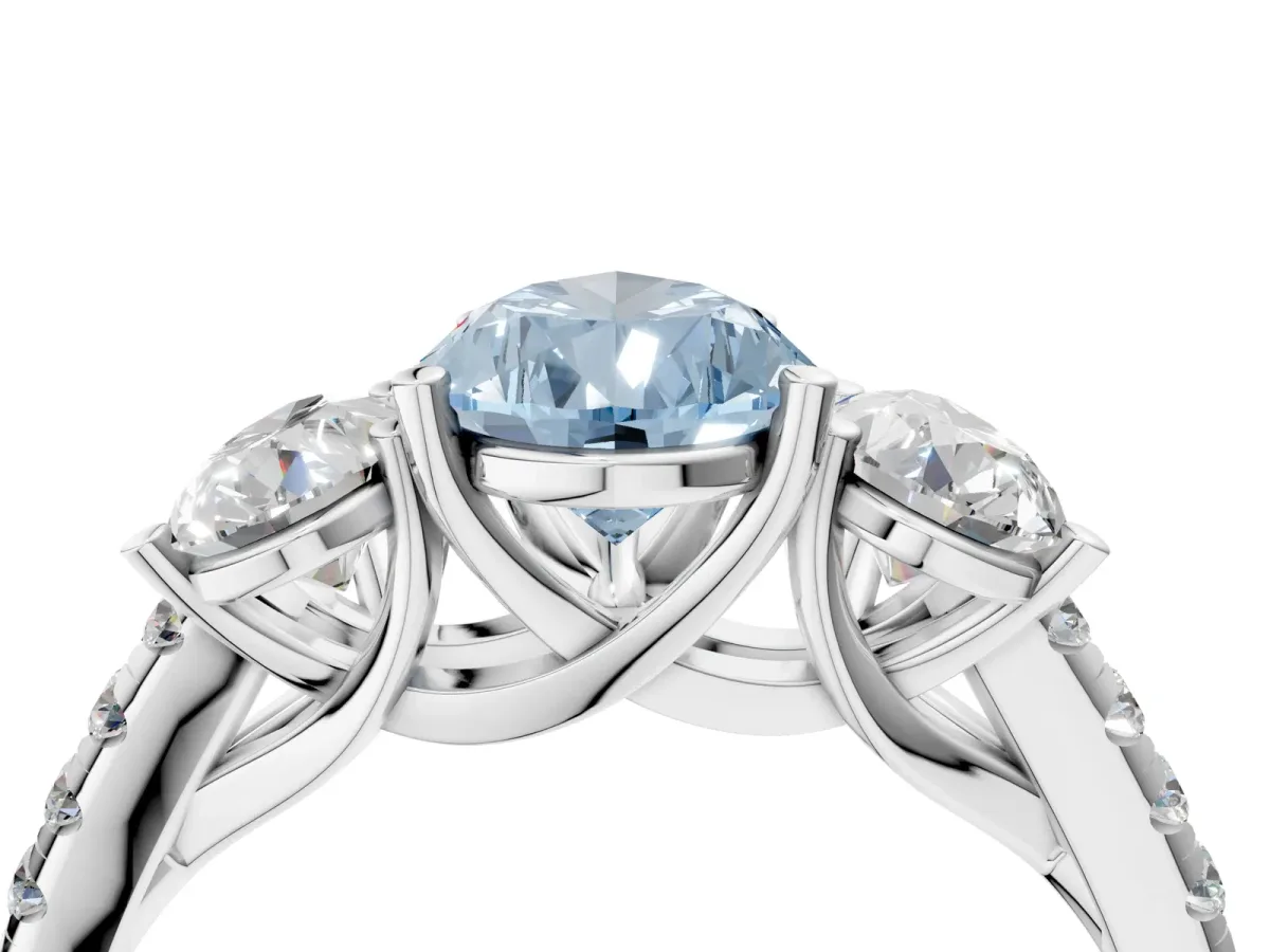 Fancy Blue Three-Stone Pear Cut Diamond Ring with Round Pavé Band and Prong Setting Platinum