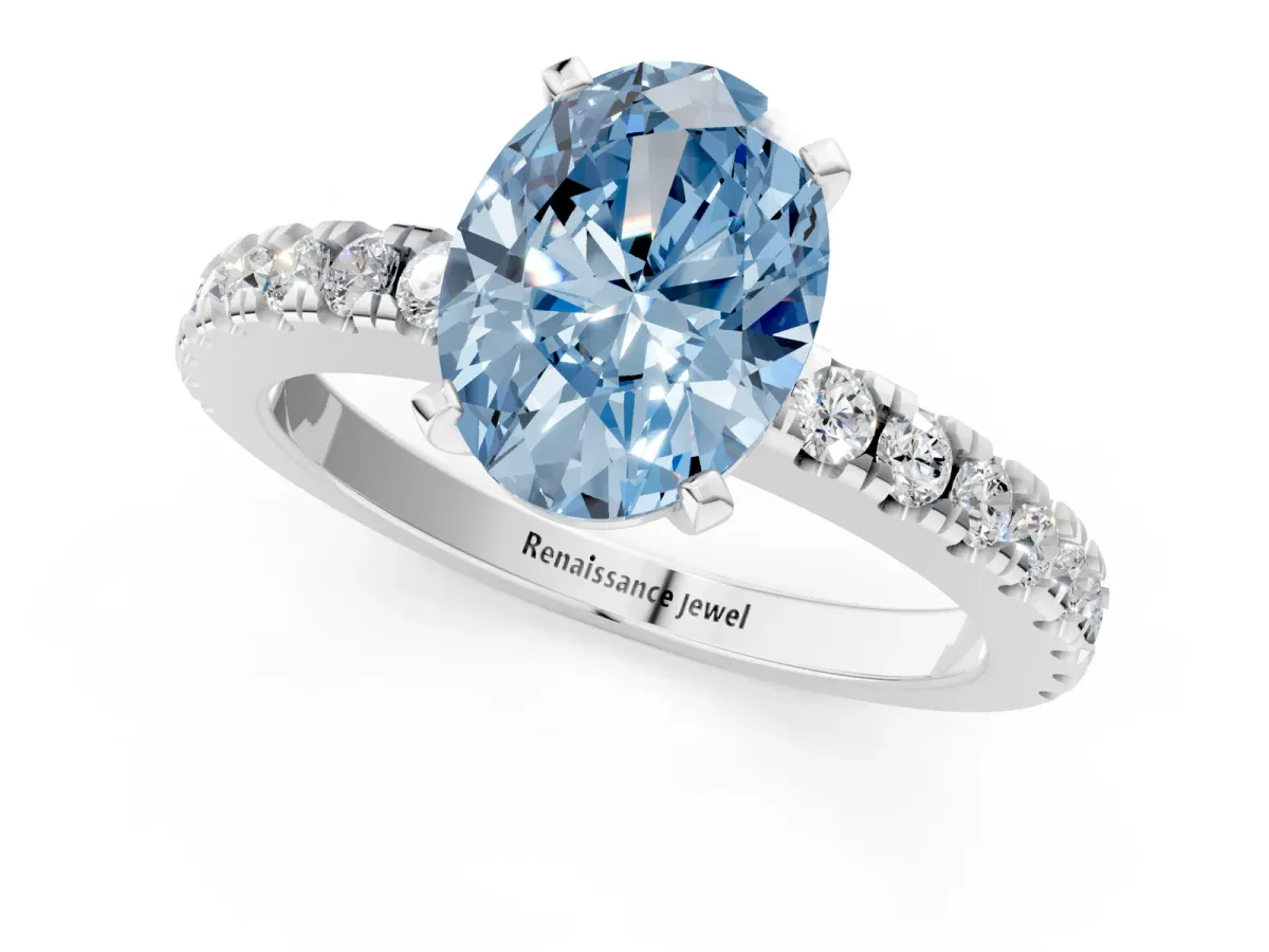 Fancy Blue Oval Cut Solitaire Diamond with Pavé Band and Four-Prong Setting Silver