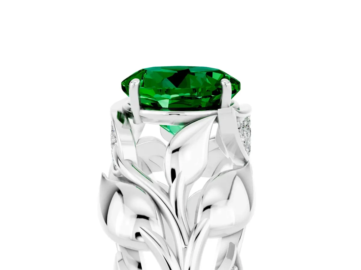 Round Cut Emerald Leaf-Inspired Engagement Ring with Round Accents and Prong Setting Silver