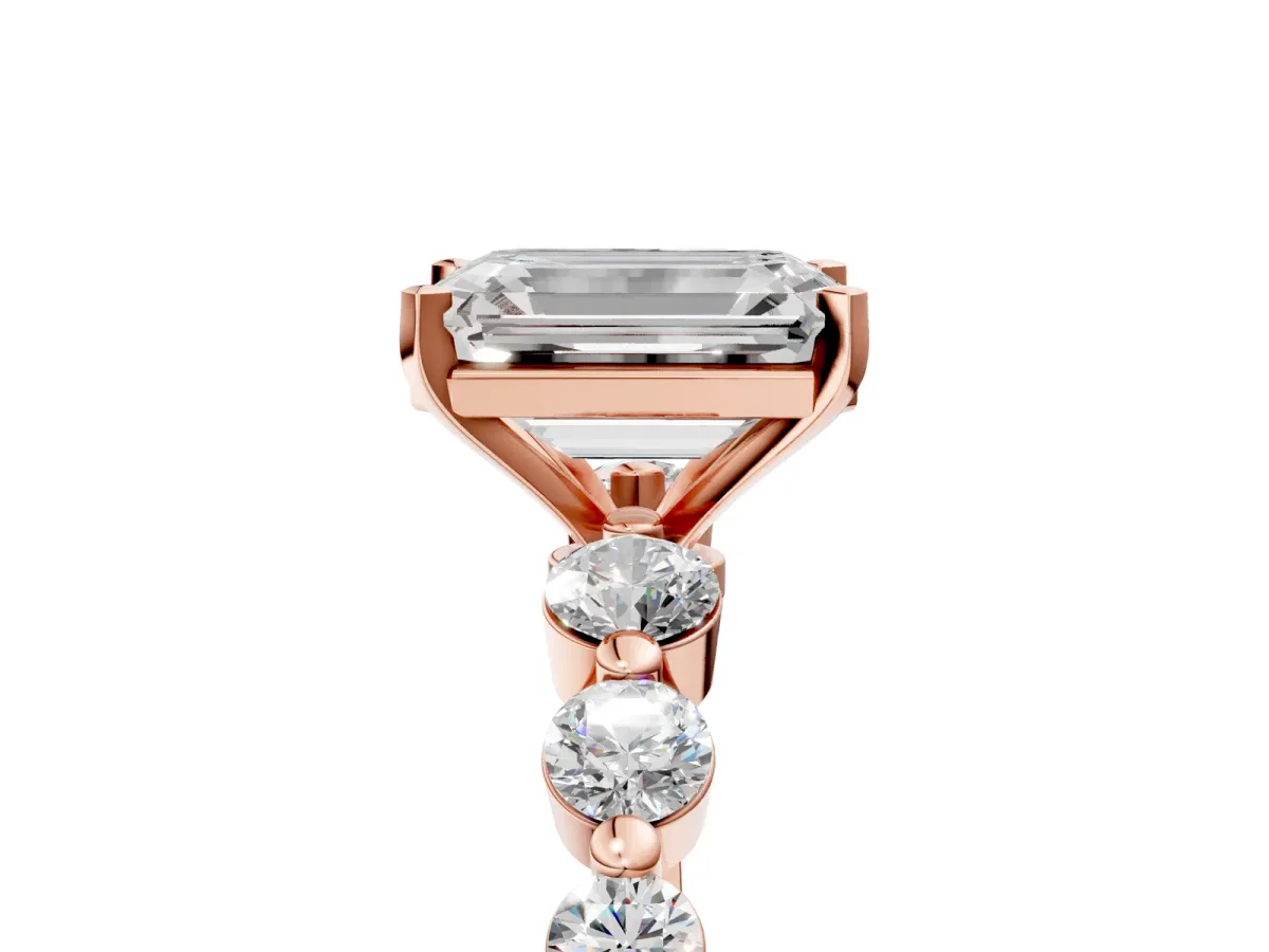 Emerald Cut Solitaire Diamond Ring with Pave Band and Four-Prong Setting Rose gold