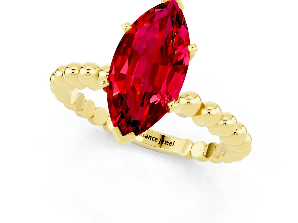 Marquise Cut Ruby Solitaire Ring with Beaded Band and Prong Setting Yellow gold