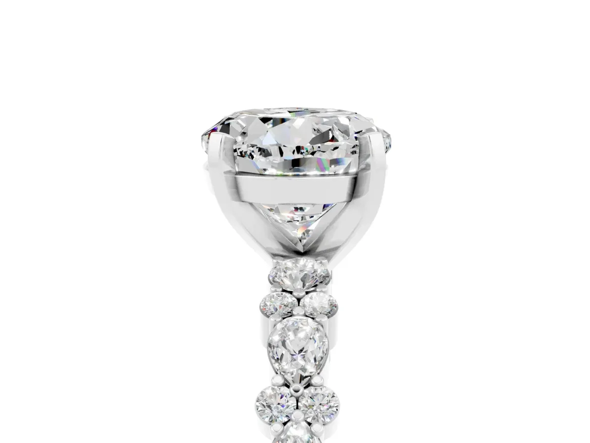 Round Cut Moissanite Side Stone Solitaire Ring with Round and Four-Prong Setting White gold