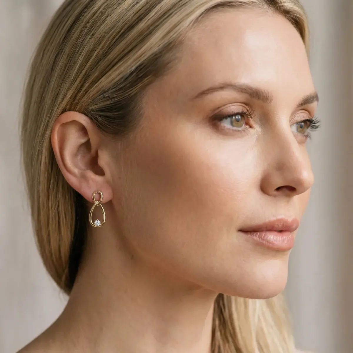 Round Diamond Teardrop Earrings with Bezel Setting and Loop Band Yellow gold