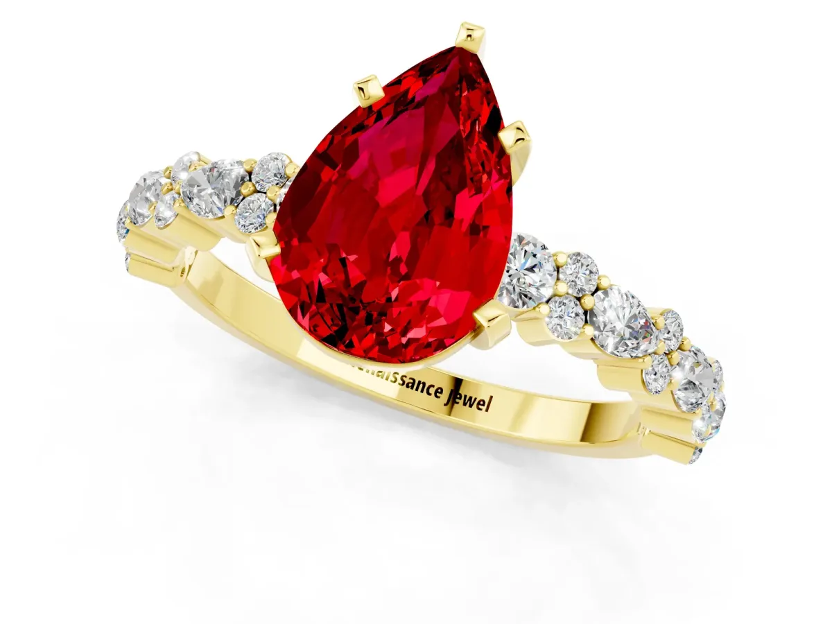 Pear Cut Ruby Side Stone Solitaire Ring with Round and Four-Prong Setting Yellow gold