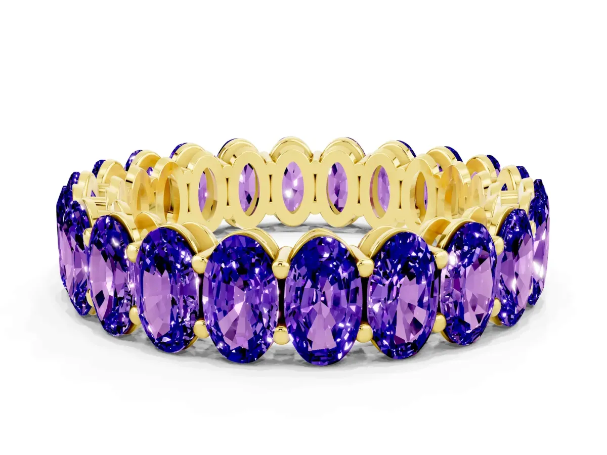 Oval Cut Tanzanite Eternity Band with Shared Prong Setting Yellow gold