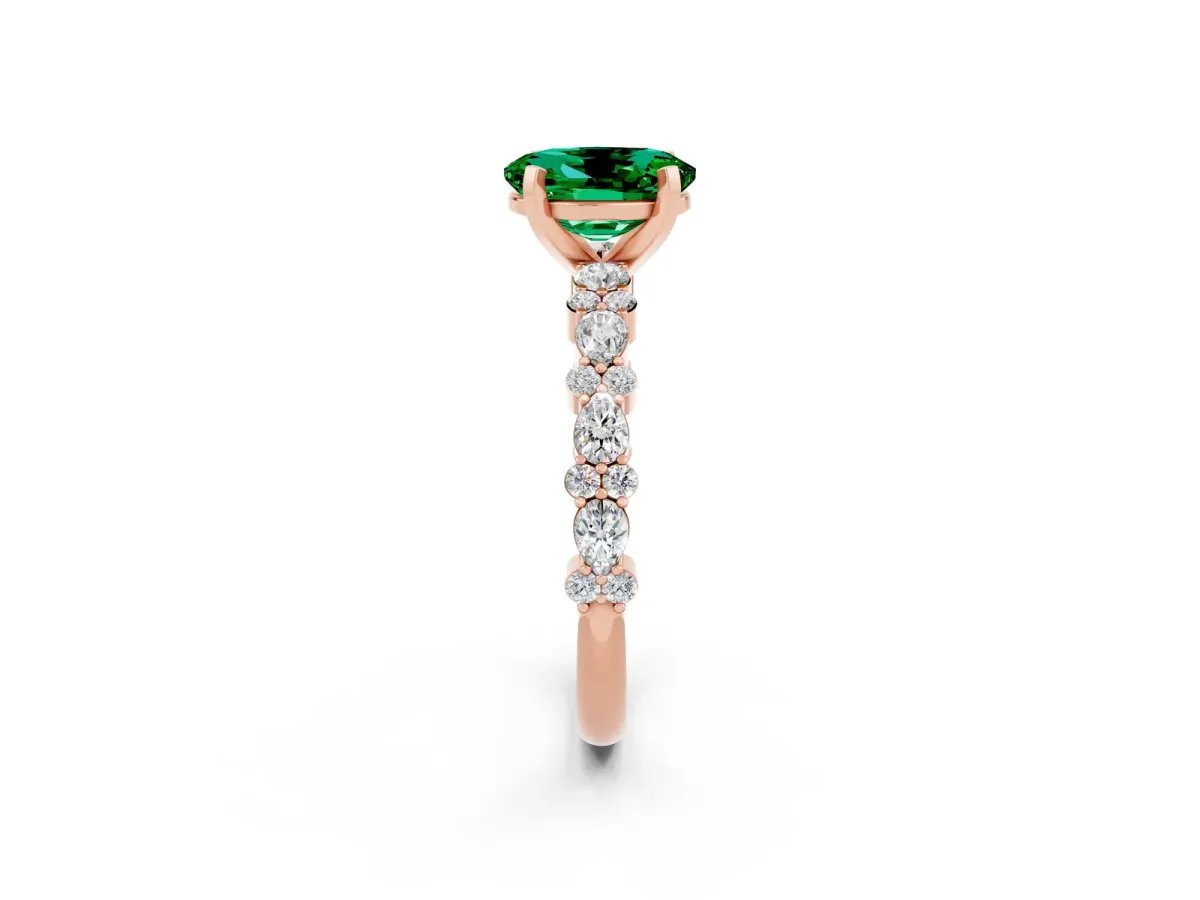 Oval Cut Emerald Side Stone Solitaire Ring with Round and Four-Prong Setting Rose gold