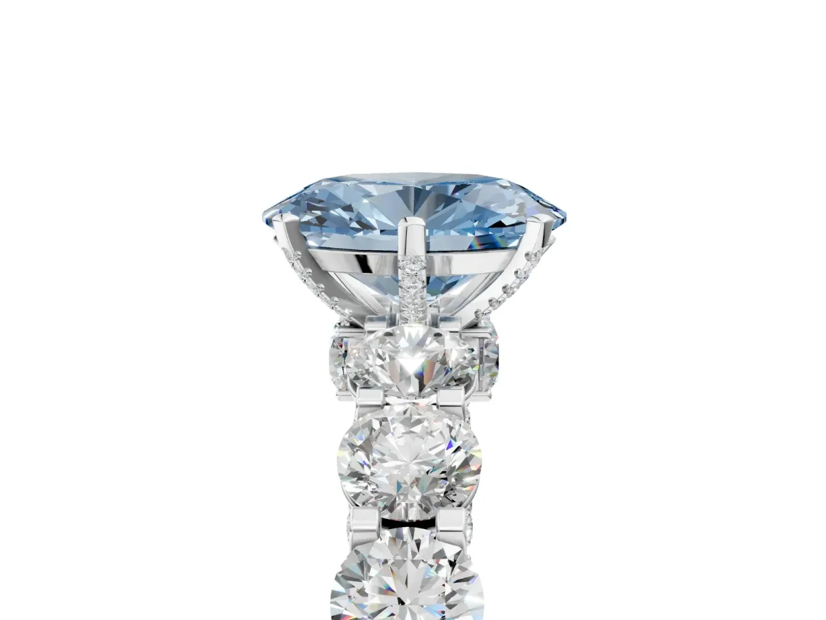 Fancy Blue Oval Cut Diamond Side Stone Engagement Ring with Four-Prong Setting White gold