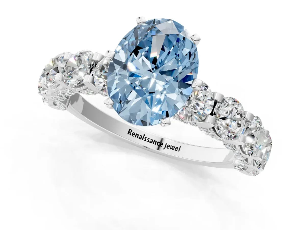 Fancy Blue Oval Cut Diamond Side Stone Engagement Ring with Four-Prong Setting White gold