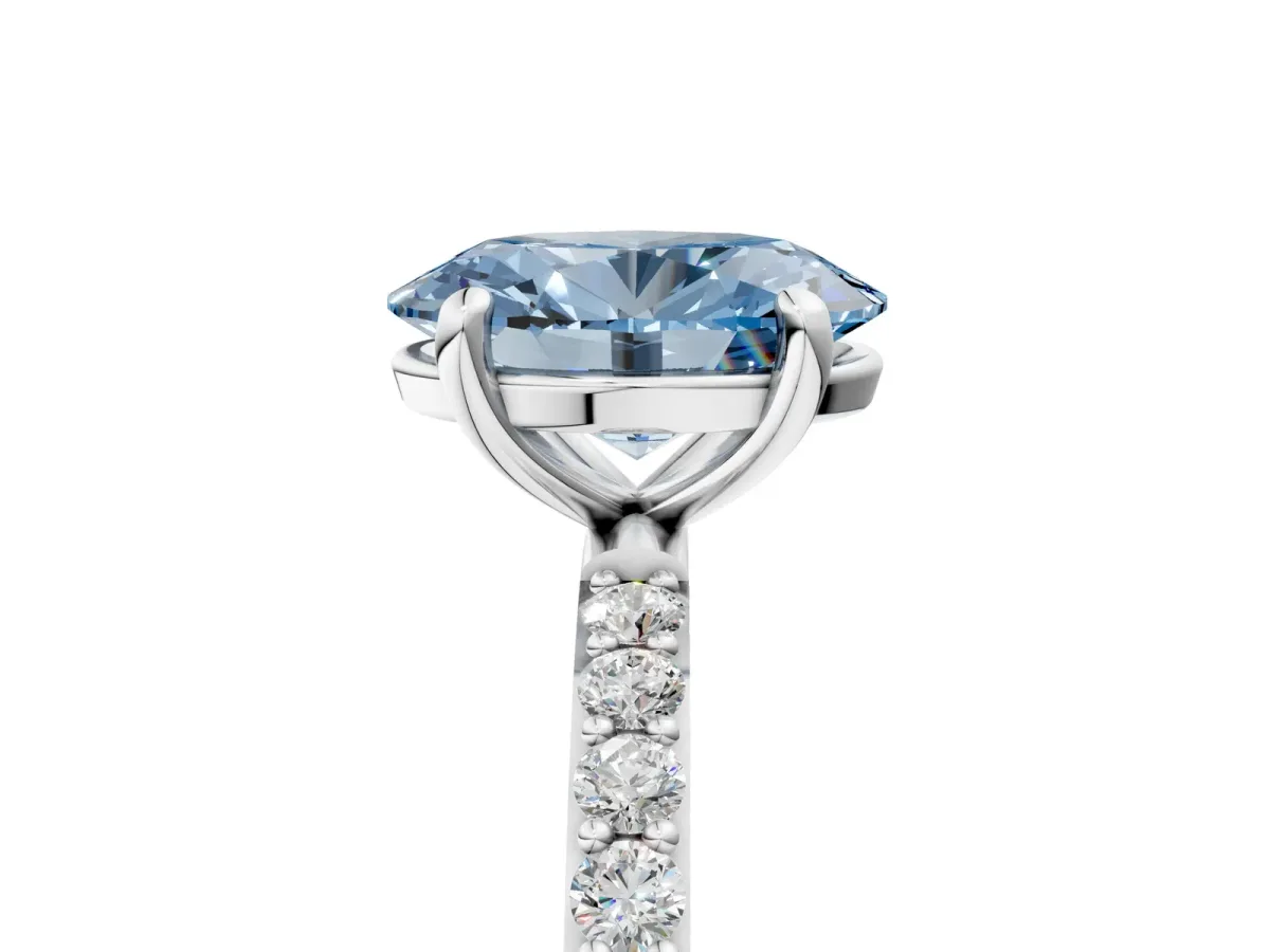 Fancy Blue Oval Cut Diamond Solitaire Ring with Round Pavé Band and Prong Setting Silver