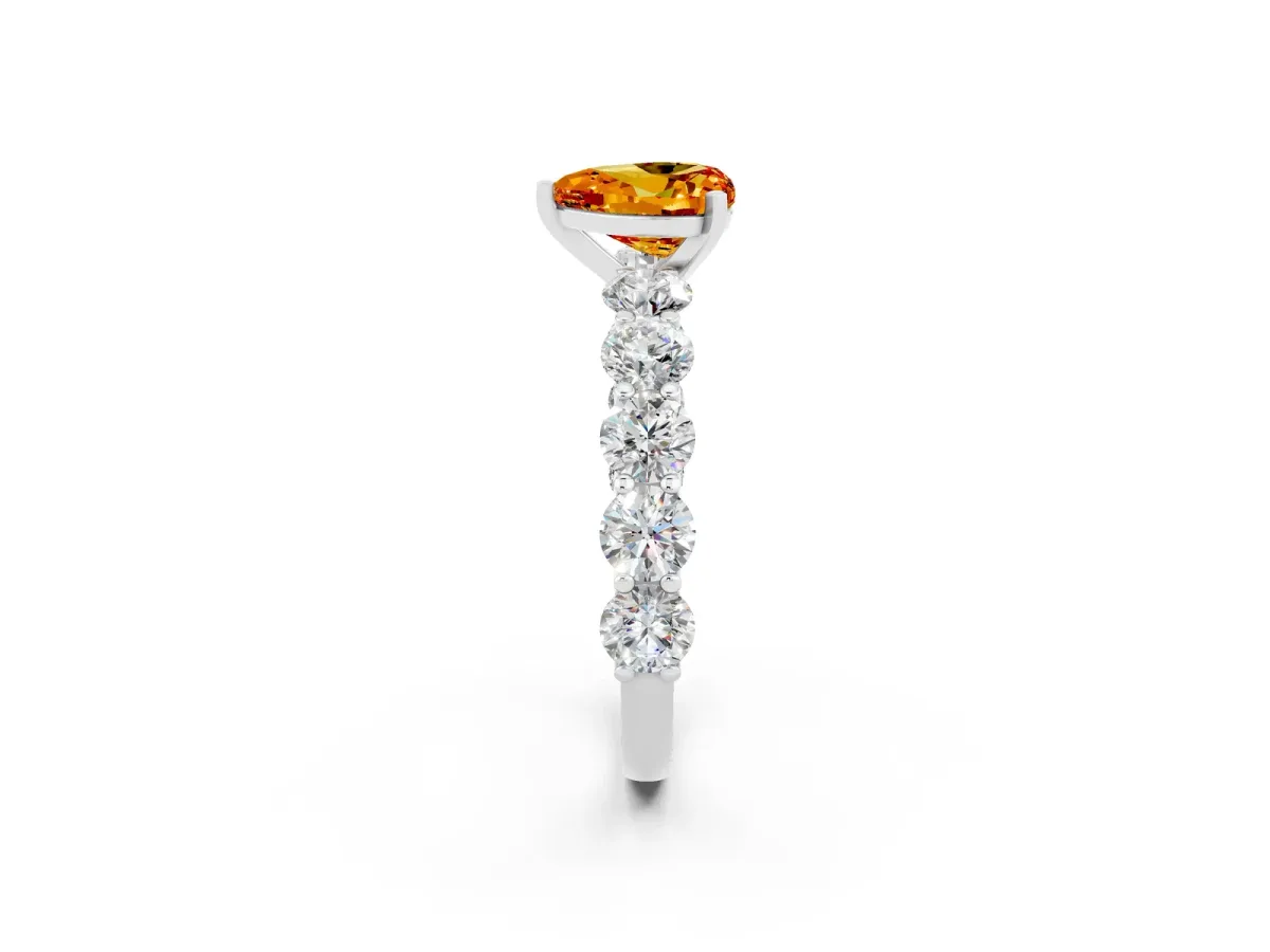 Heart Cut Citrine Prong Setting with Side Stones on a Pave Band Silver