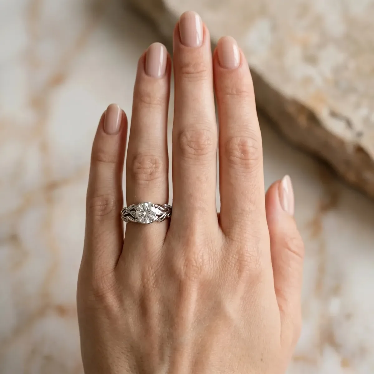 Round Cut Diamond Leaf-Inspired Engagement Ring with Round Accents and Prong Setting Silver