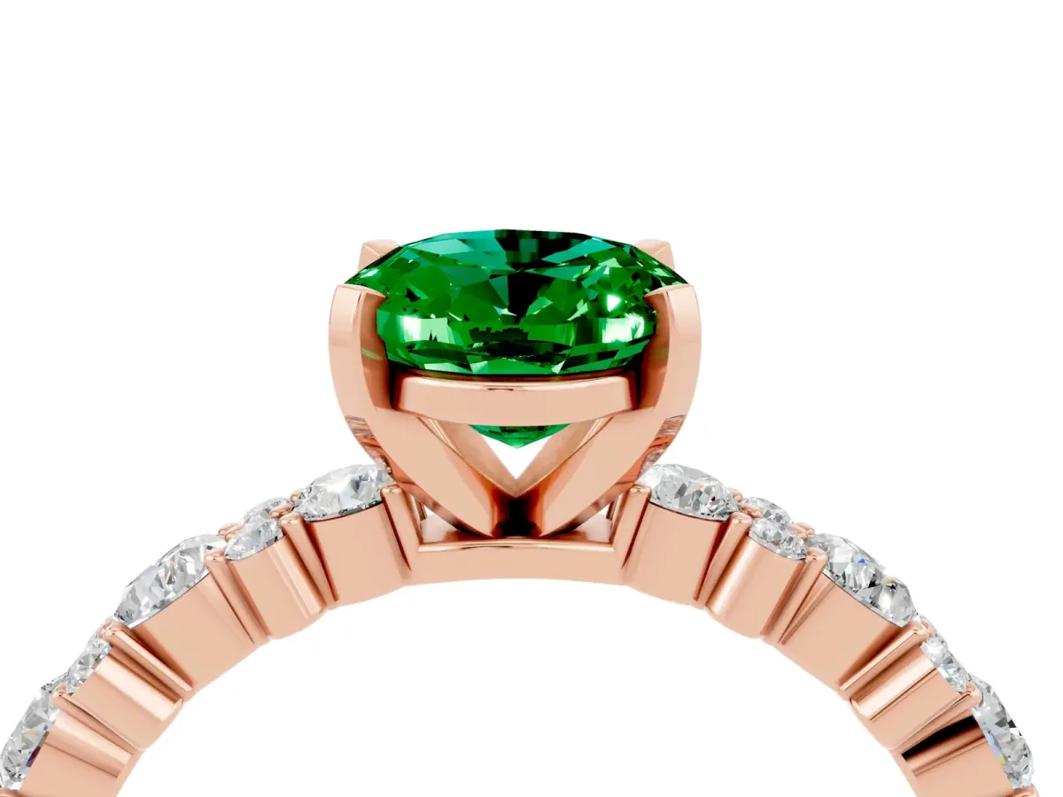 Oval Cut Emerald Side Stone Solitaire Ring with Round and Four-Prong Setting Rose gold