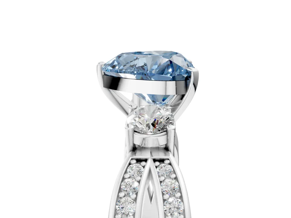 Fancy Blue Three-Stone Heart Cut Cut Diamond Twist Band with Prong Setting Platinum