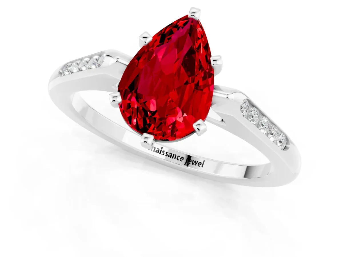 Pear Cut Ruby Solitaire Ring with Channel Set Round Band and Prong Setting White gold