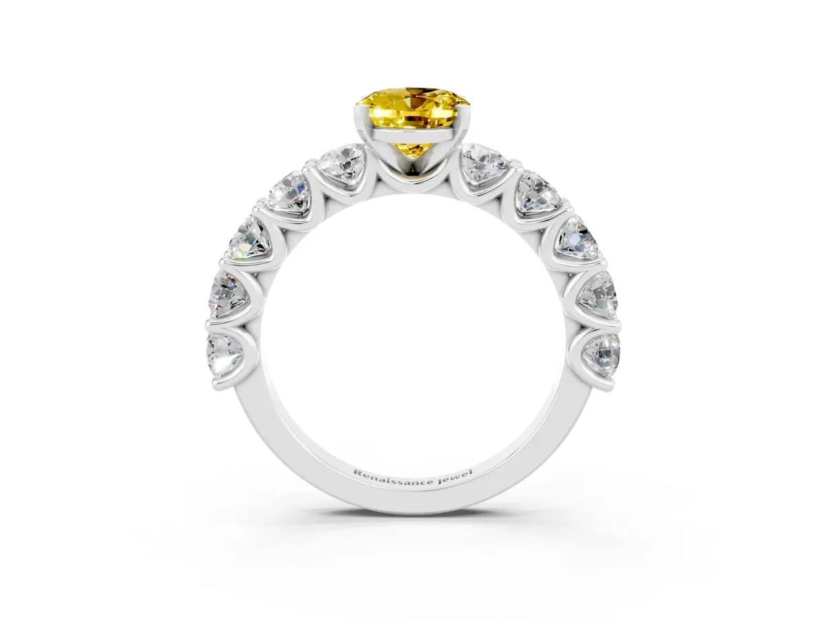 Oval Cut Yellow Sapphire Prong Setting with Side Stones on a Pave Band Silver
