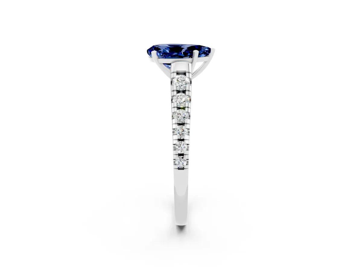 Pear Cut Blue Sapphire Cathedral Solitaire Ring with Round Pavé Band Silver