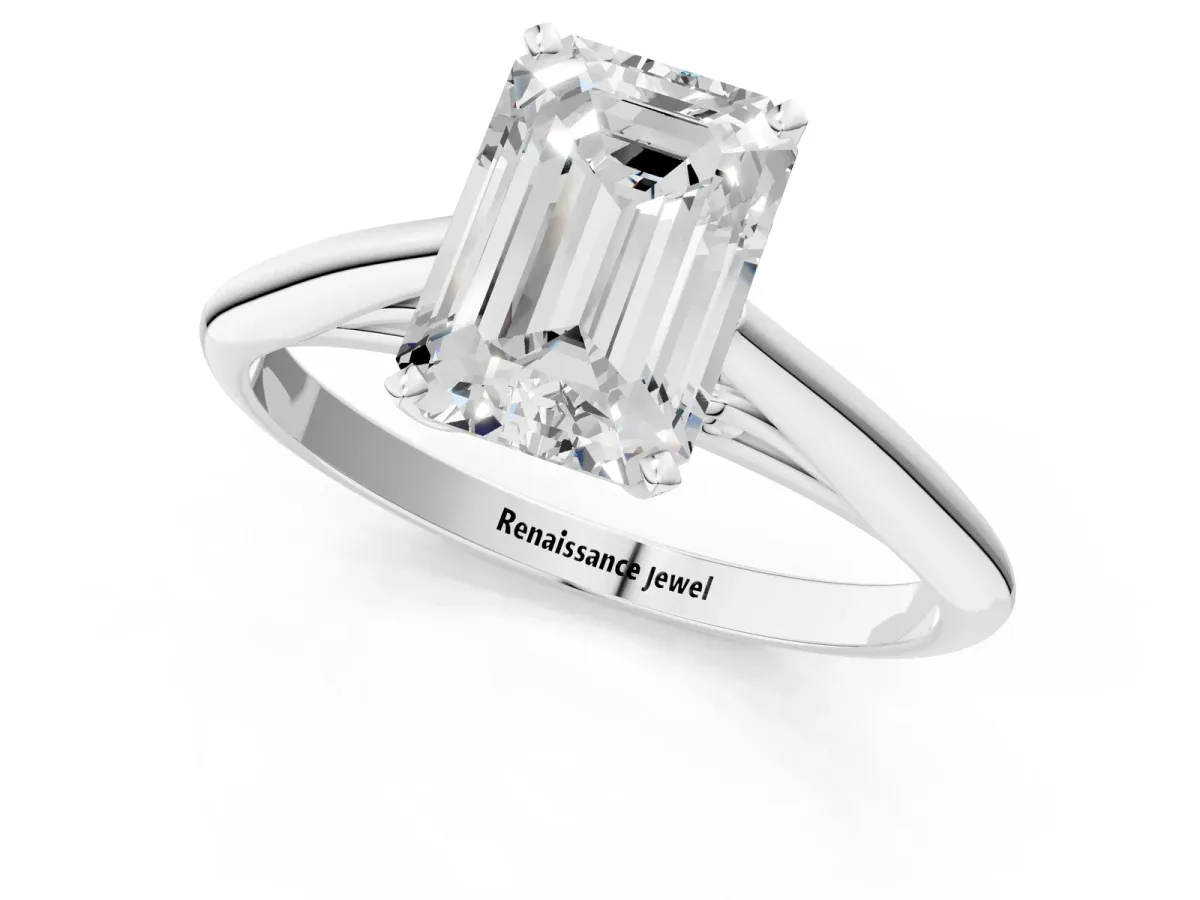 Emerald Cut Diamond Solitaire Engagement Ring with Cathedral Setting and Four-Prong Mount White gold