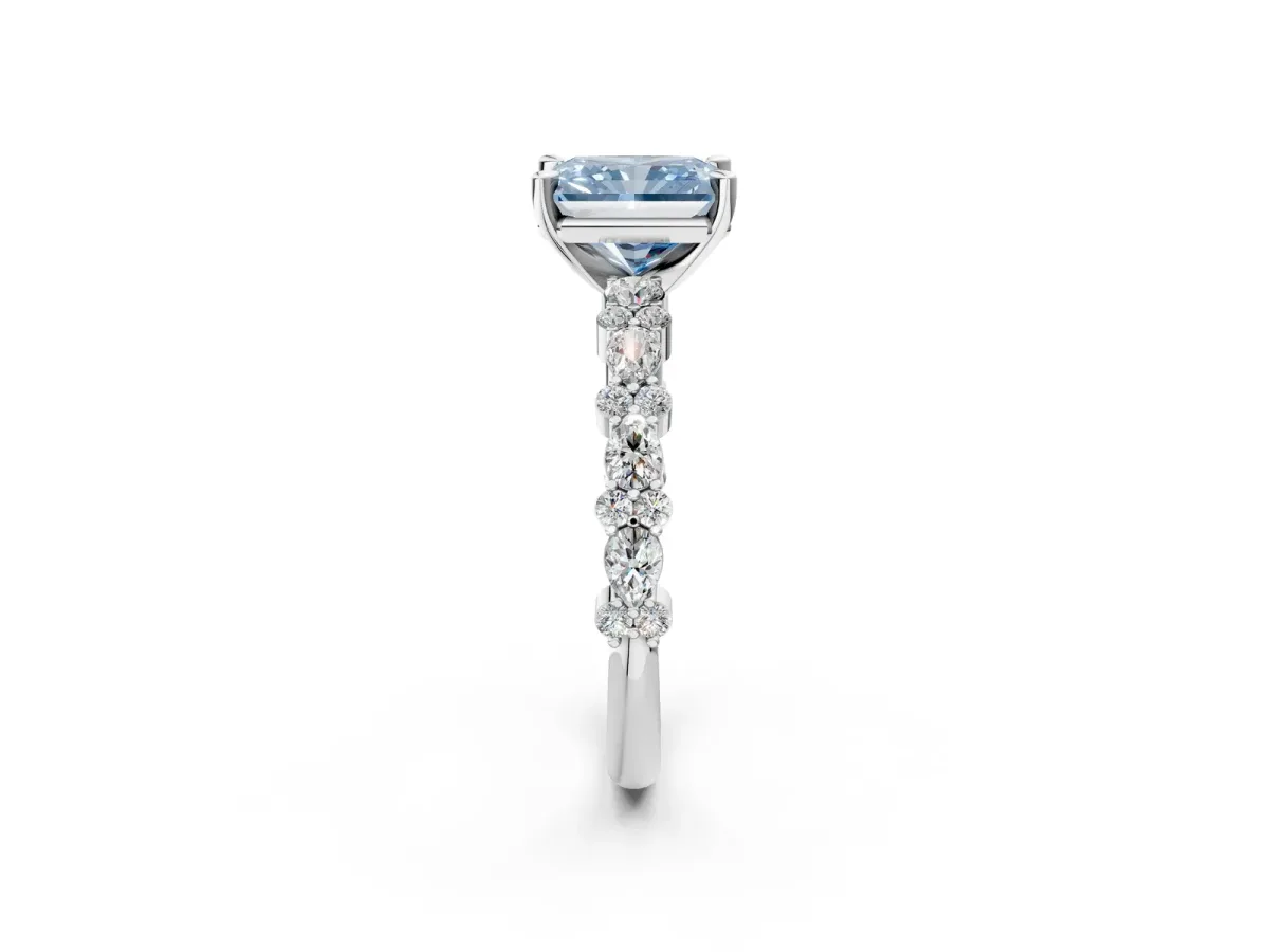 Fancy Blue Radiant Cut Diamond Side Stone Solitaire Ring with Round and Four-Prong Setting Platinum