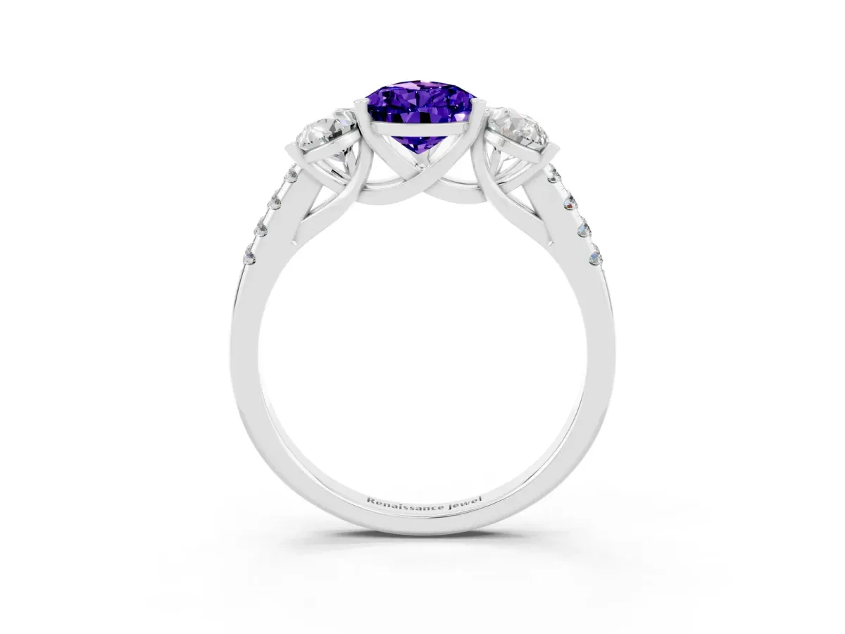 Three-Stone Pear Cut Tanzanite Ring with Round Pavé Band and Prong Setting Platinum