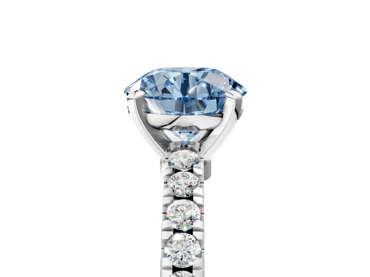 Fancy Blue Round Cut Solitaire Diamond with Pavé Band and Four-Prong Setting Silver