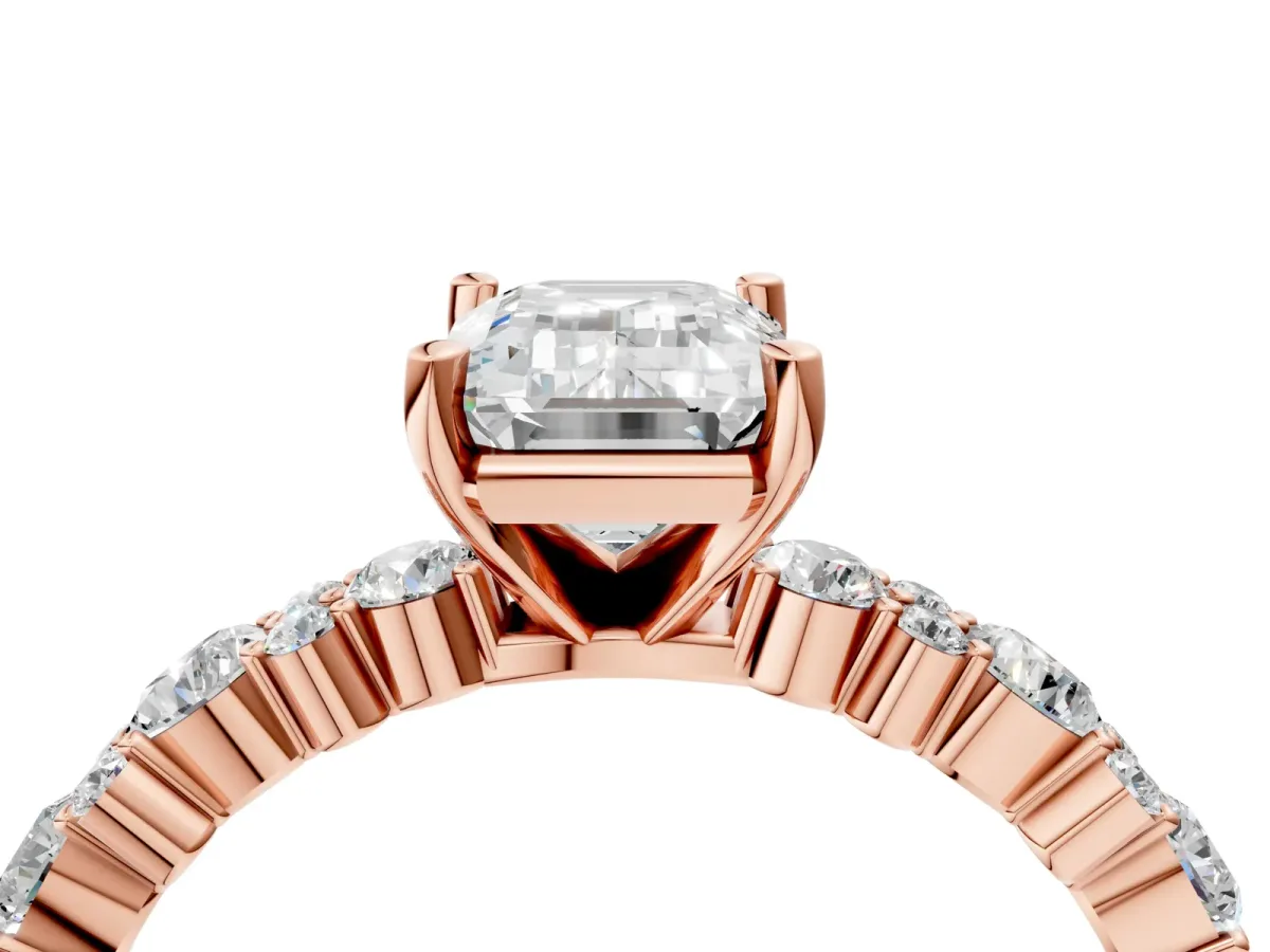 Emerald Cut Diamond Side Stone Solitaire Ring with Round and Four-Prong Setting Rose gold