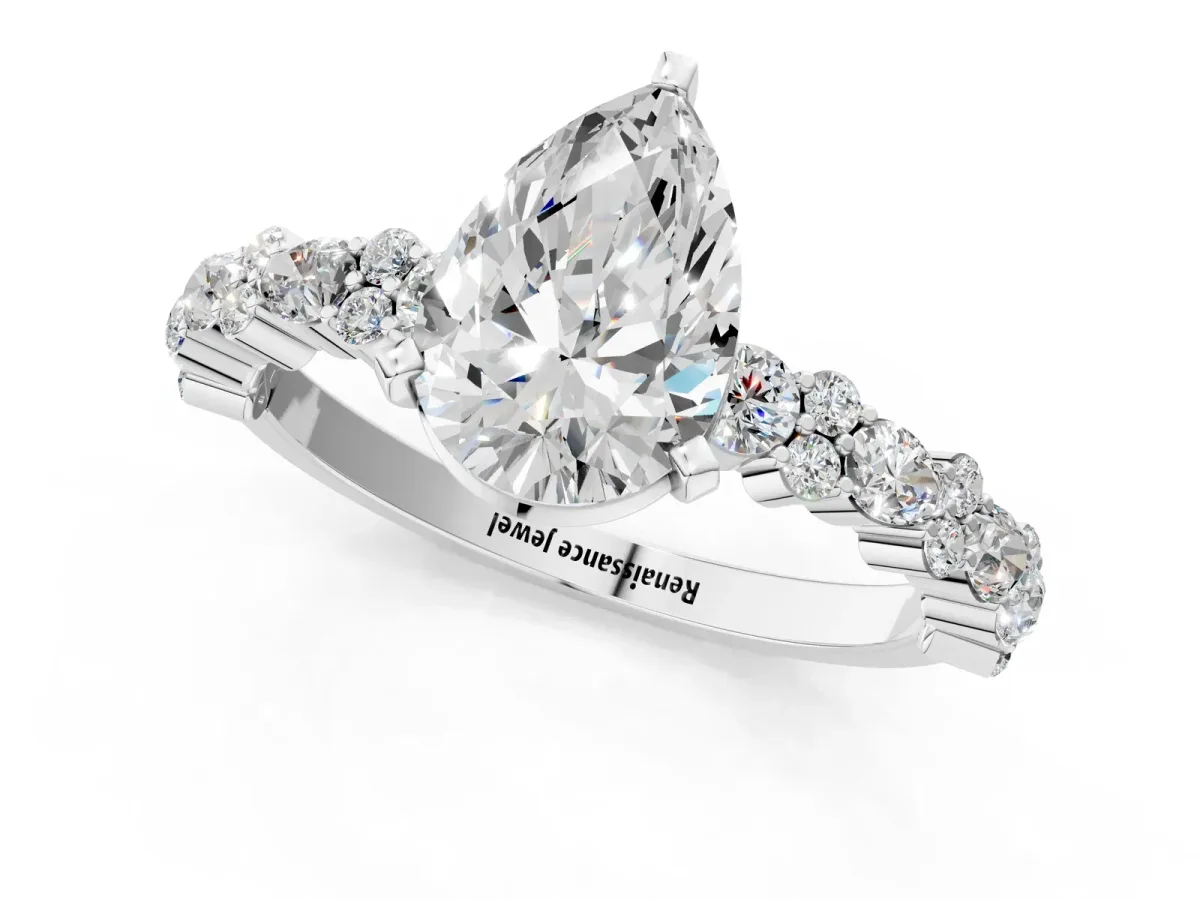 Pear Cut Diamond Side Stone Solitaire Ring with Round and Four-Prong Setting Platinum