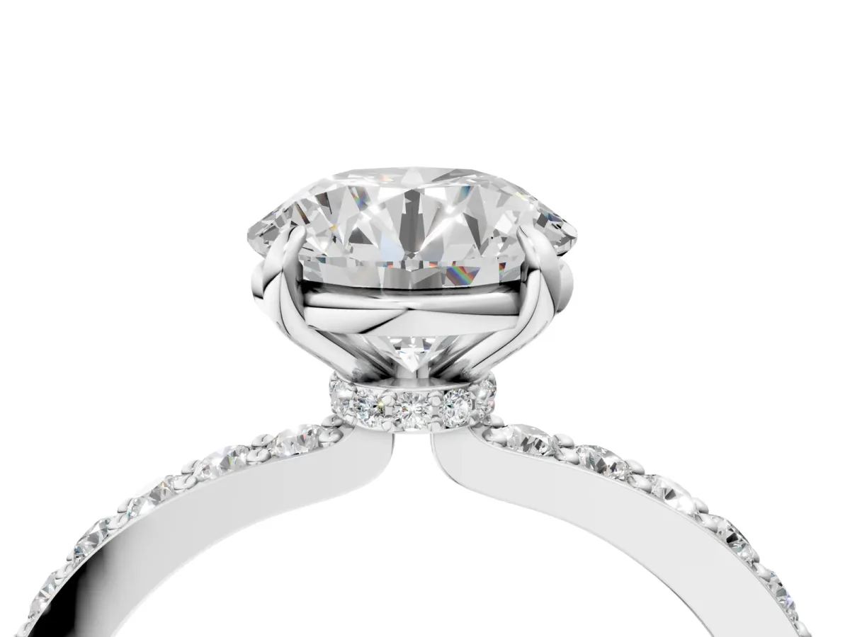 Round Cut Diamond Solitaire Engagement Ring with Pavé Band and Four-Prong Setting Silver