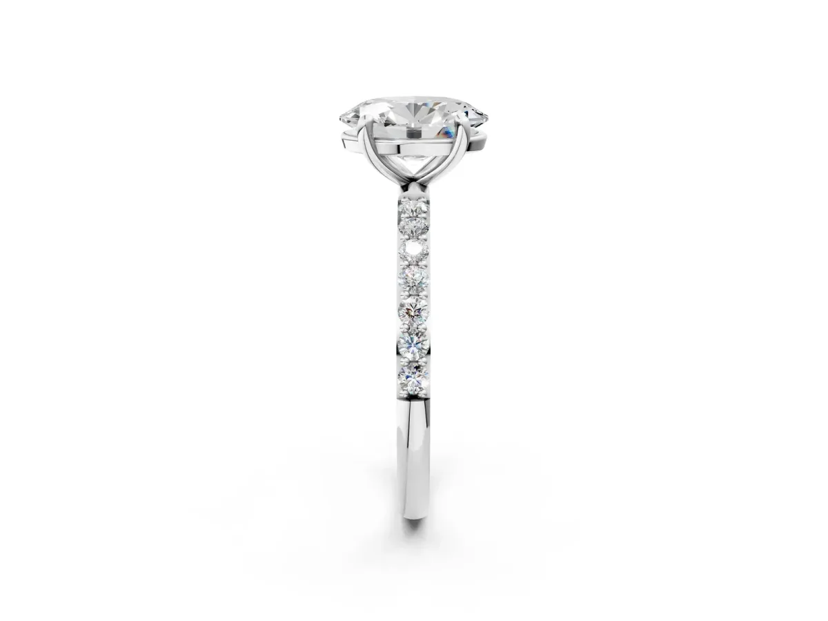 Oval Cut Diamond Solitaire Ring with Round Pavé Band and Prong Setting Silver