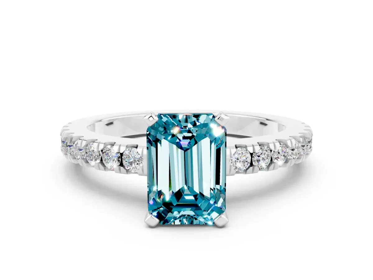 Emerald Cut Solitaire Blue Topaz with Pavé Band and Four-Prong Setting Silver