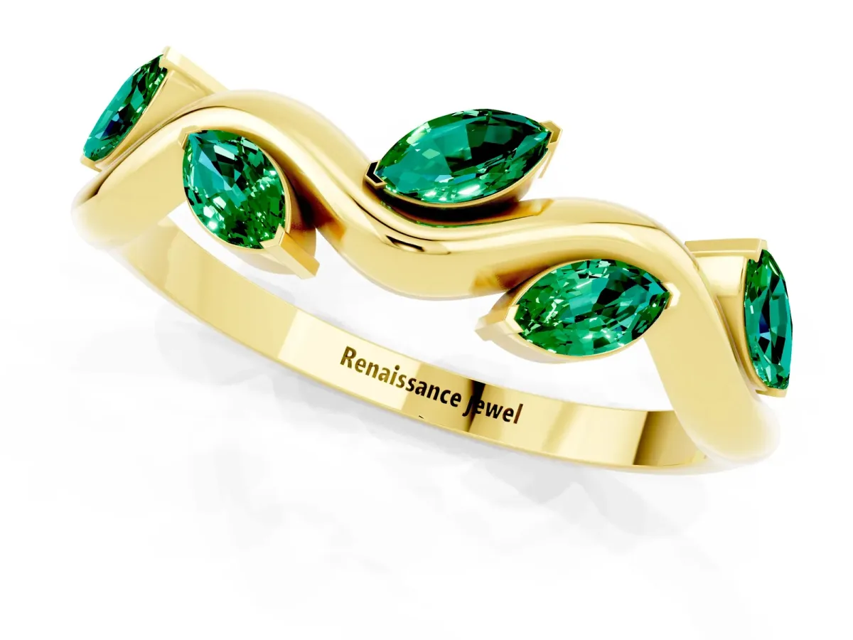 Marquise Emerald Twisted Band with Prong Setting Yellow gold