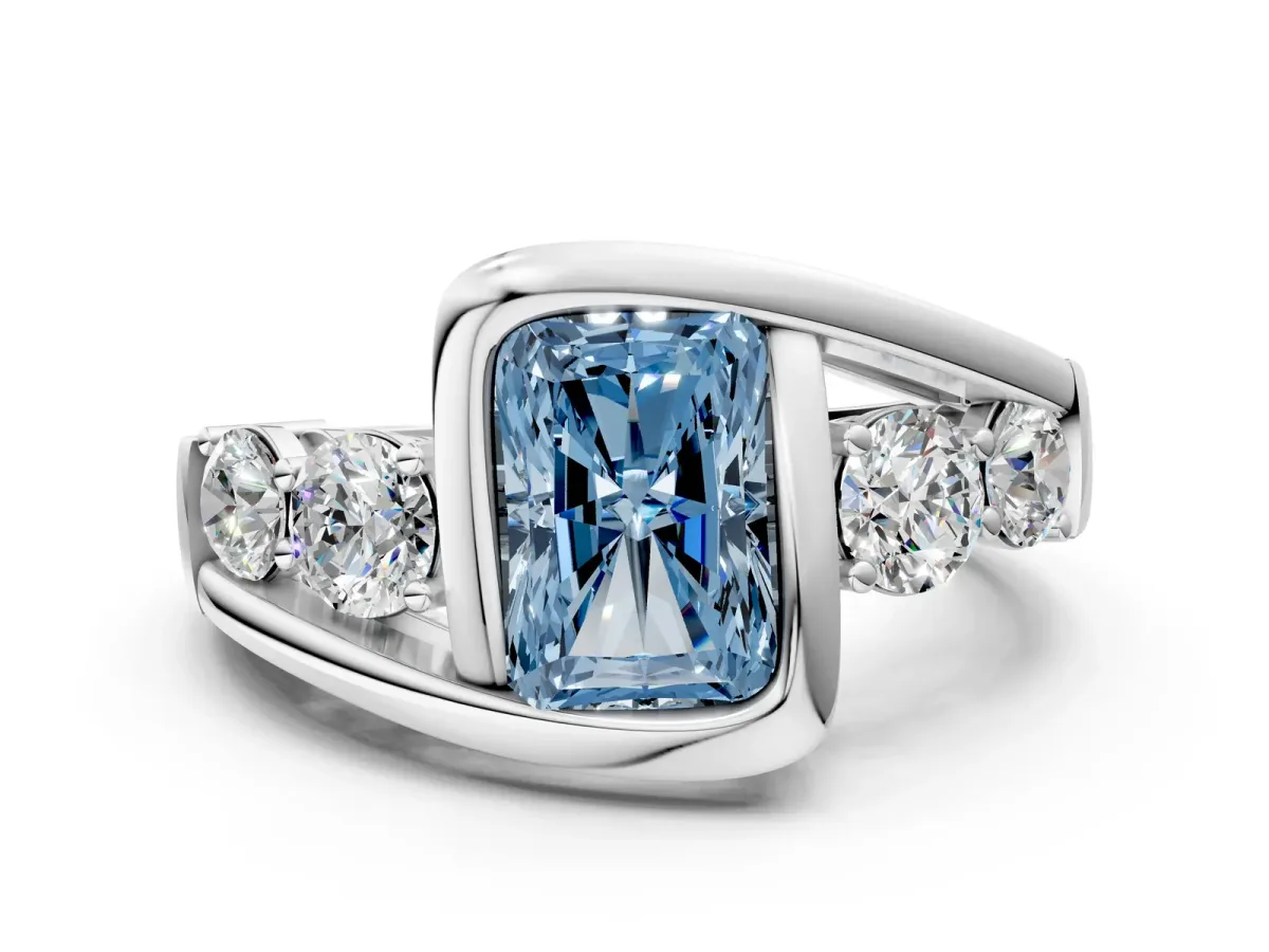 Fancy Blue Bezel Set Radiant Cut Diamond Bypass Ring with Round Accents Silver