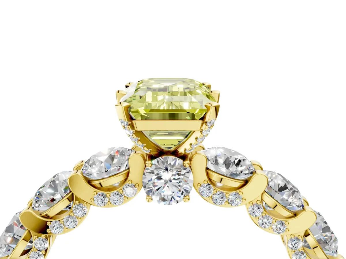 Fancy Yellow Emerald Cut Diamond Side Stone Engagement Ring with Four-Prong Setting Yellow gold