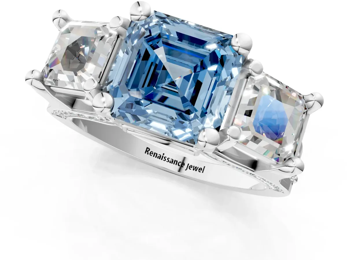 Fancy Blue Asscher Cut Diamond Three-Stone Ring with Channel Set Band and Four-Prong Setting Platinum