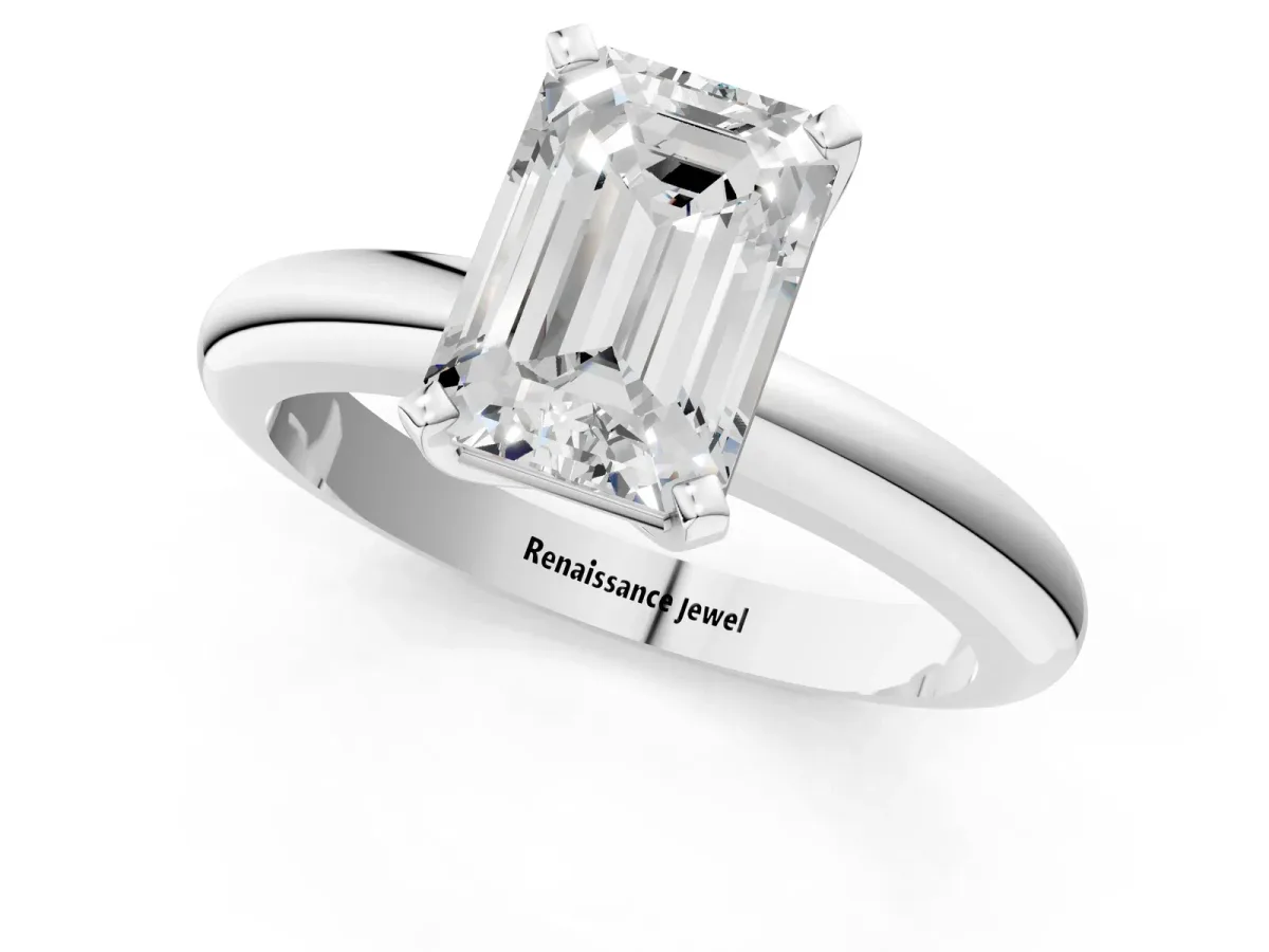Emerald Cut Diamond Solitaire Engagement Ring with Round Band and Four-Prong Setting Silver
