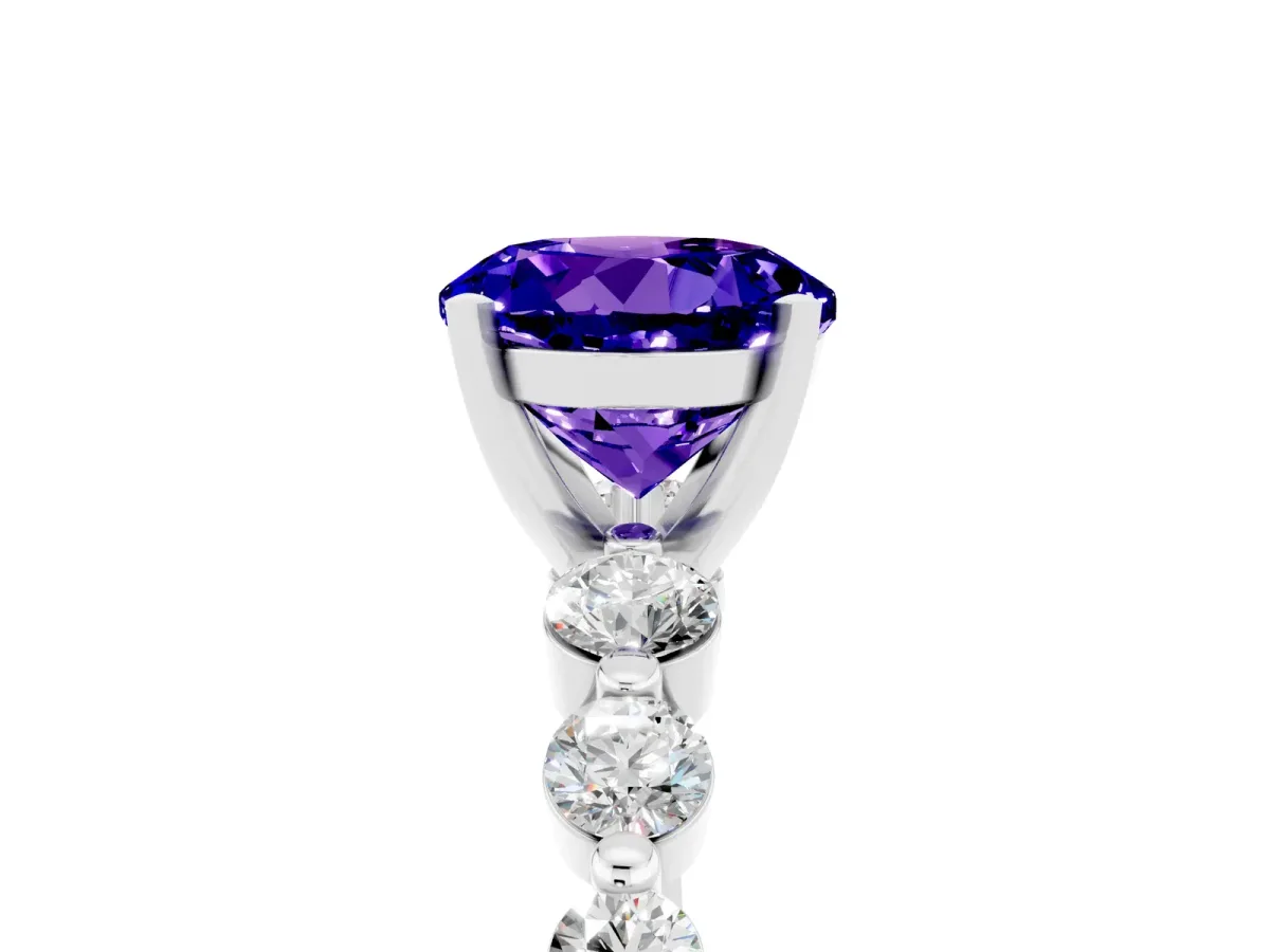 Round Cut Solitaire Tanzanite Ring with Pave Band and Four-Prong Setting Silver