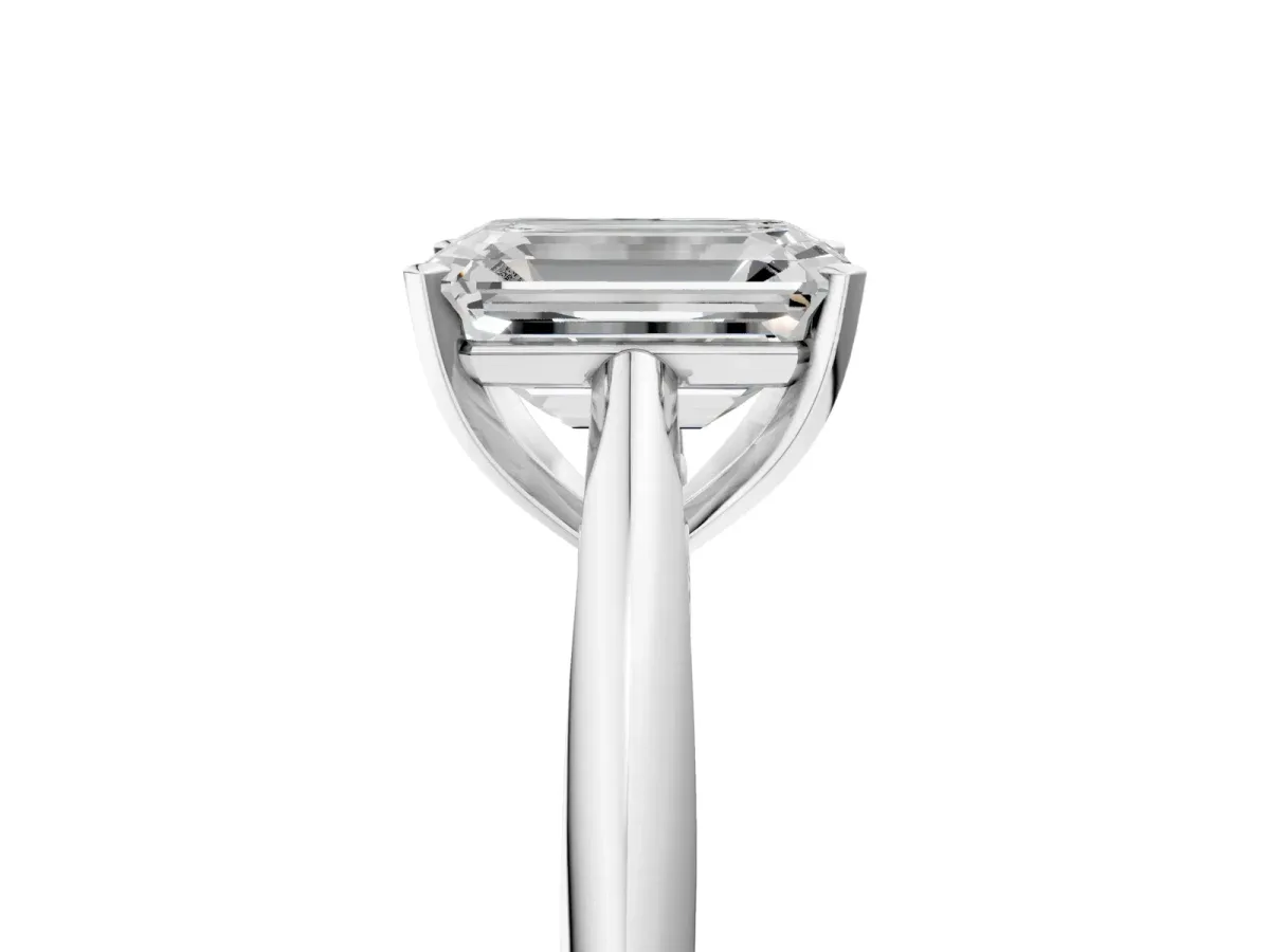 Emerald Cut Diamond Solitaire Engagement Ring with Cathedral Setting and Four-Prong Mount White gold