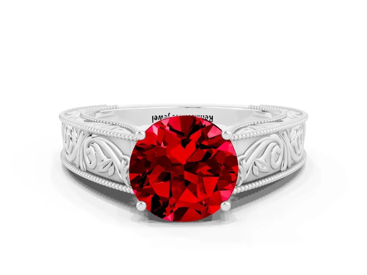Round Cut Ruby Solitaire Ring with Engraved Band and Four-Prong Setting White gold