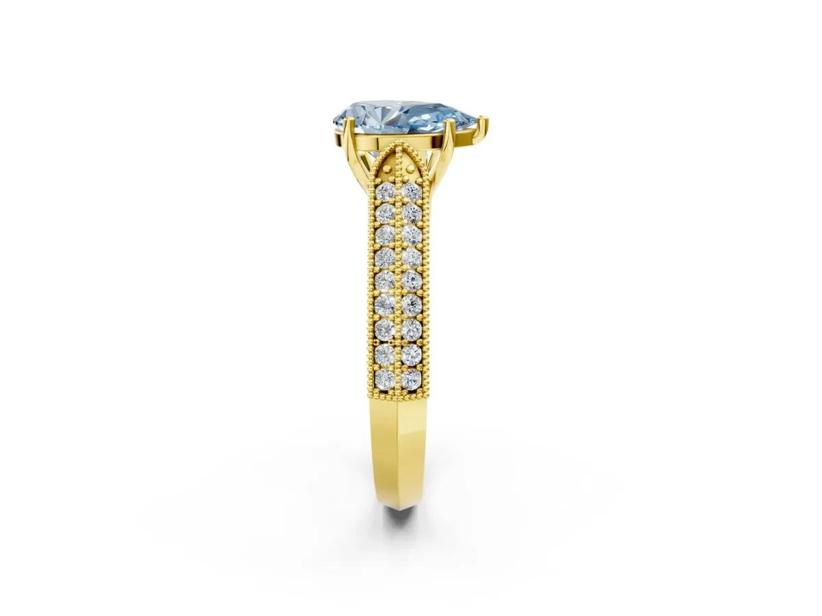Fancy Blue Pear Cut Cut Pave Split Shank Engagement Ring with Four-Prong Setting Yellow gold