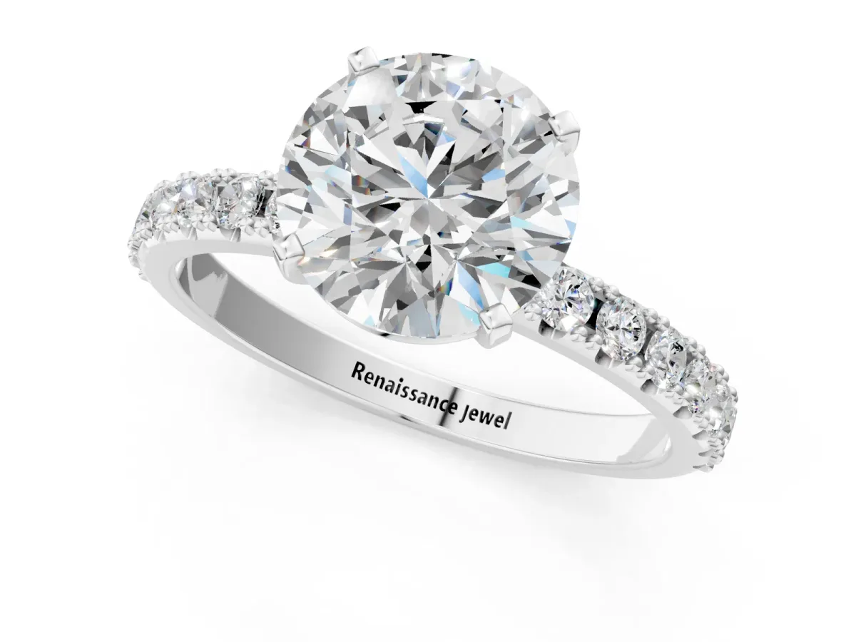 Round Cut Diamond Solitaire Pavé Band with Four-Prong Setting White gold