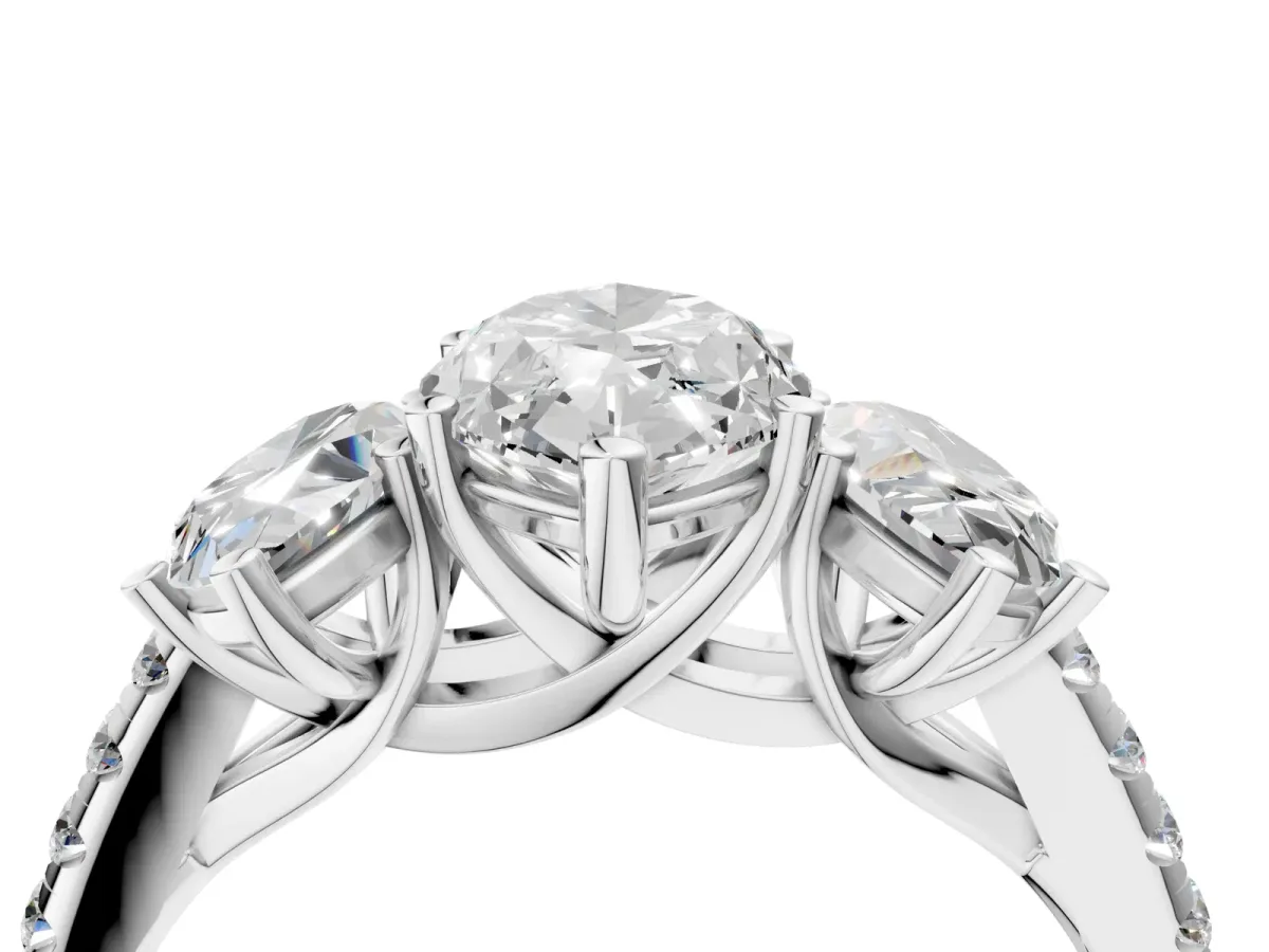 Three-Stone Marquise Cut Diamond Ring with Round Pavé Band and Prong Setting Platinum
