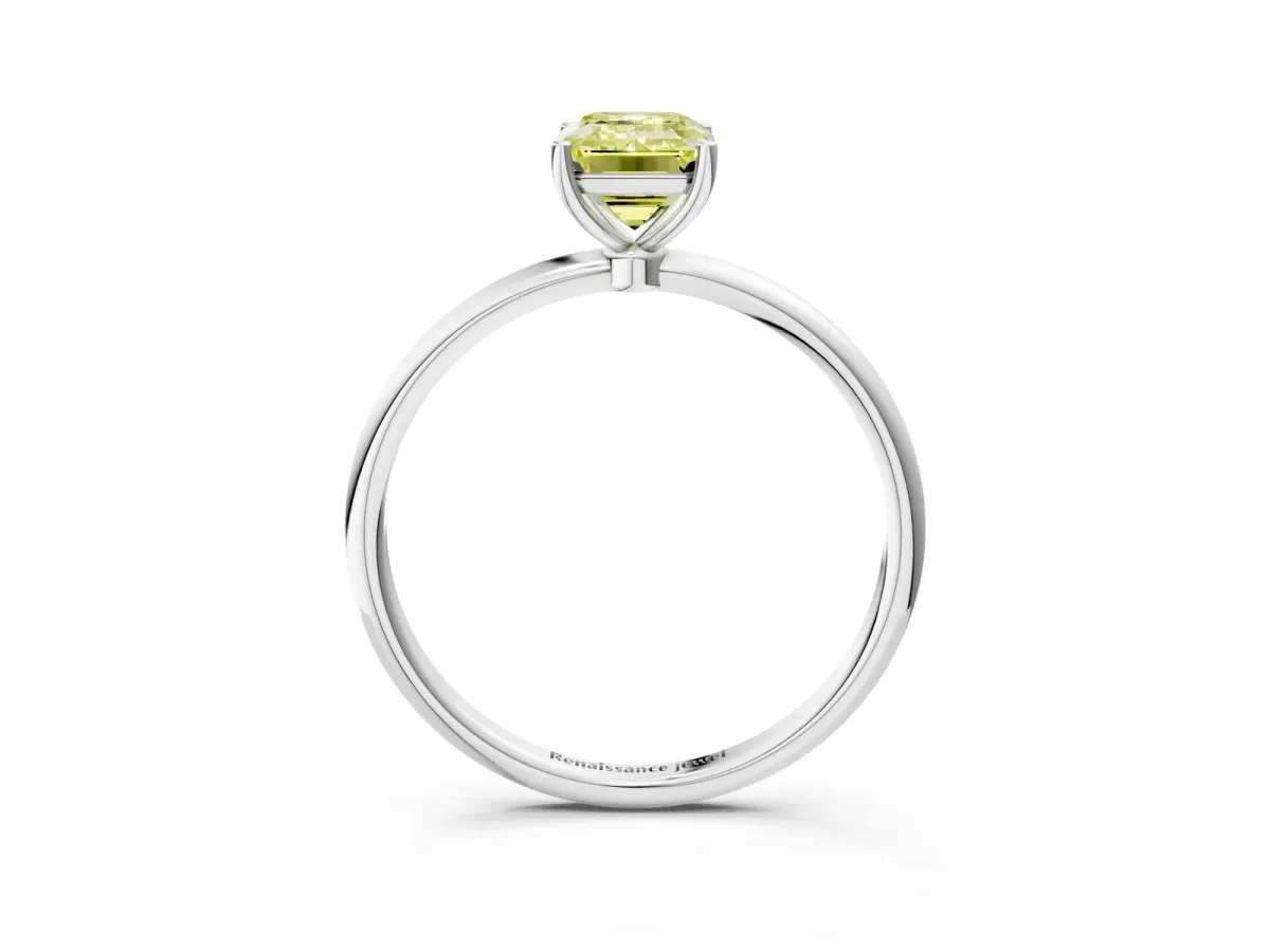 Fancy Yellow Emerald Cut Cut Solitaire Engagement Ring with Thin Band and Four-Prong Setting Silver
