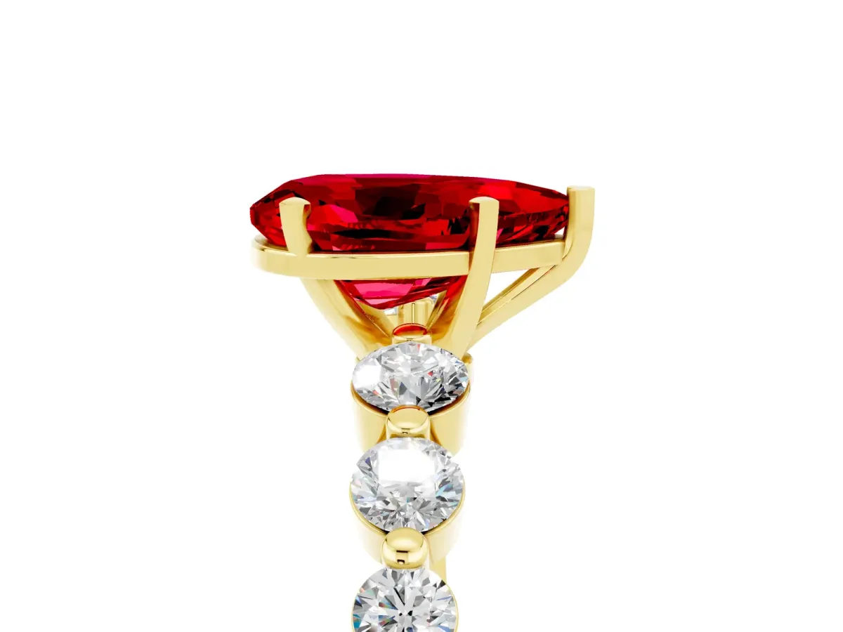 Pear Cut Solitaire Ruby Ring with Pave Band and Four-Prong Setting Yellow gold