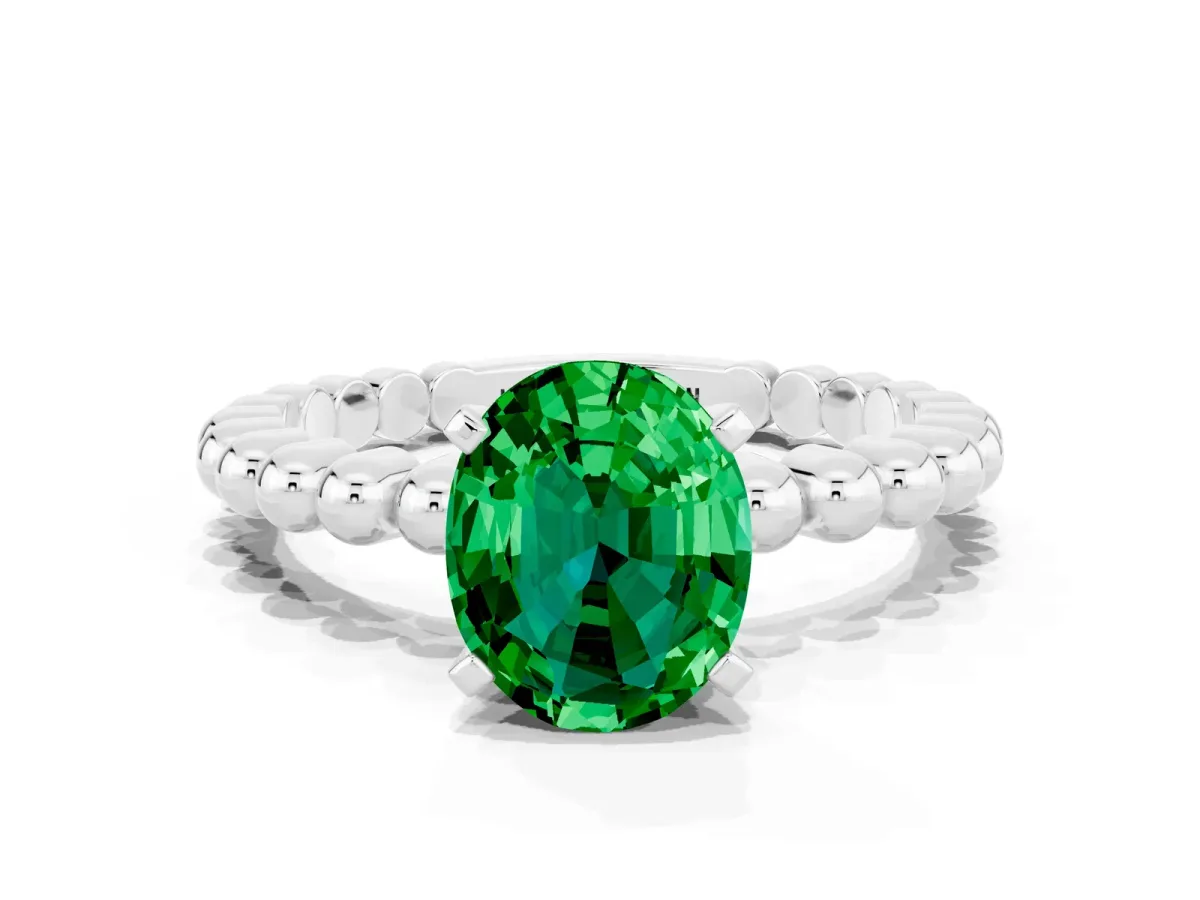 Oval Cut Emerald Solitaire Ring with Beaded Band and Prong Setting Silver
